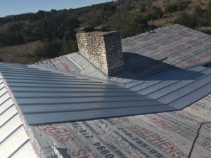 The Installation of a Metal Roof Being Completed by Stephens Roofing & Remodeling