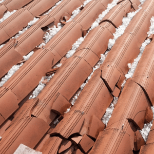 broken/damaged roof tiles on a roof