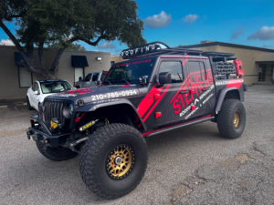 Stephens Wrapped Jeep Ready to Go Out on a Roof Inspection